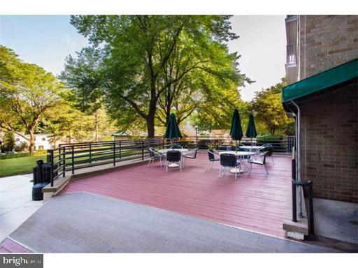 1600 Hagys Ford Road, Unit 7R Narberth, PA 19072 - Photo 17 of 20 a view of a backyard with sitting area