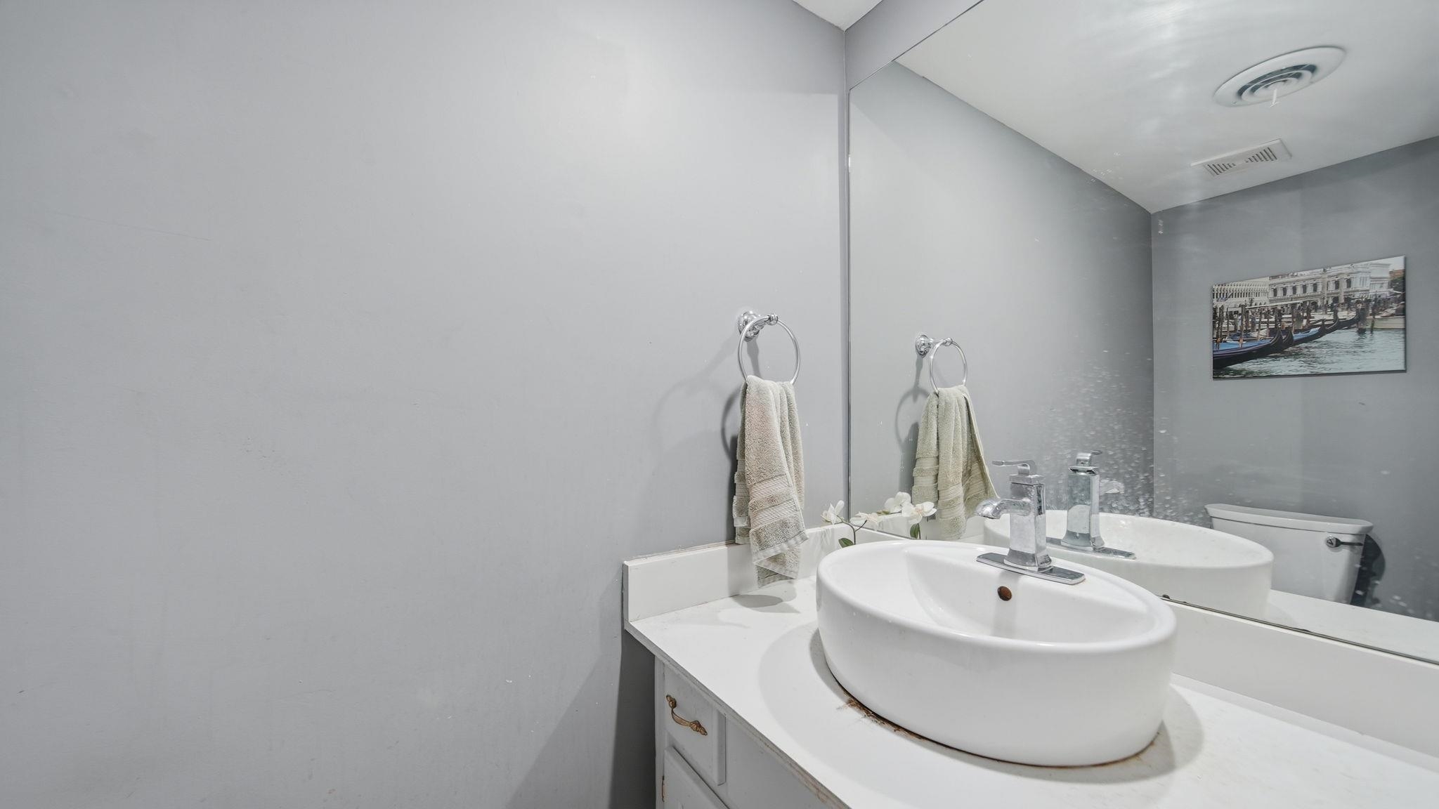 5866 Roxbury Drive, Unit 5866 Memphis, TN 38119 - Photo 11 of 20 Vanity with a white countertop and oval vessel sink
