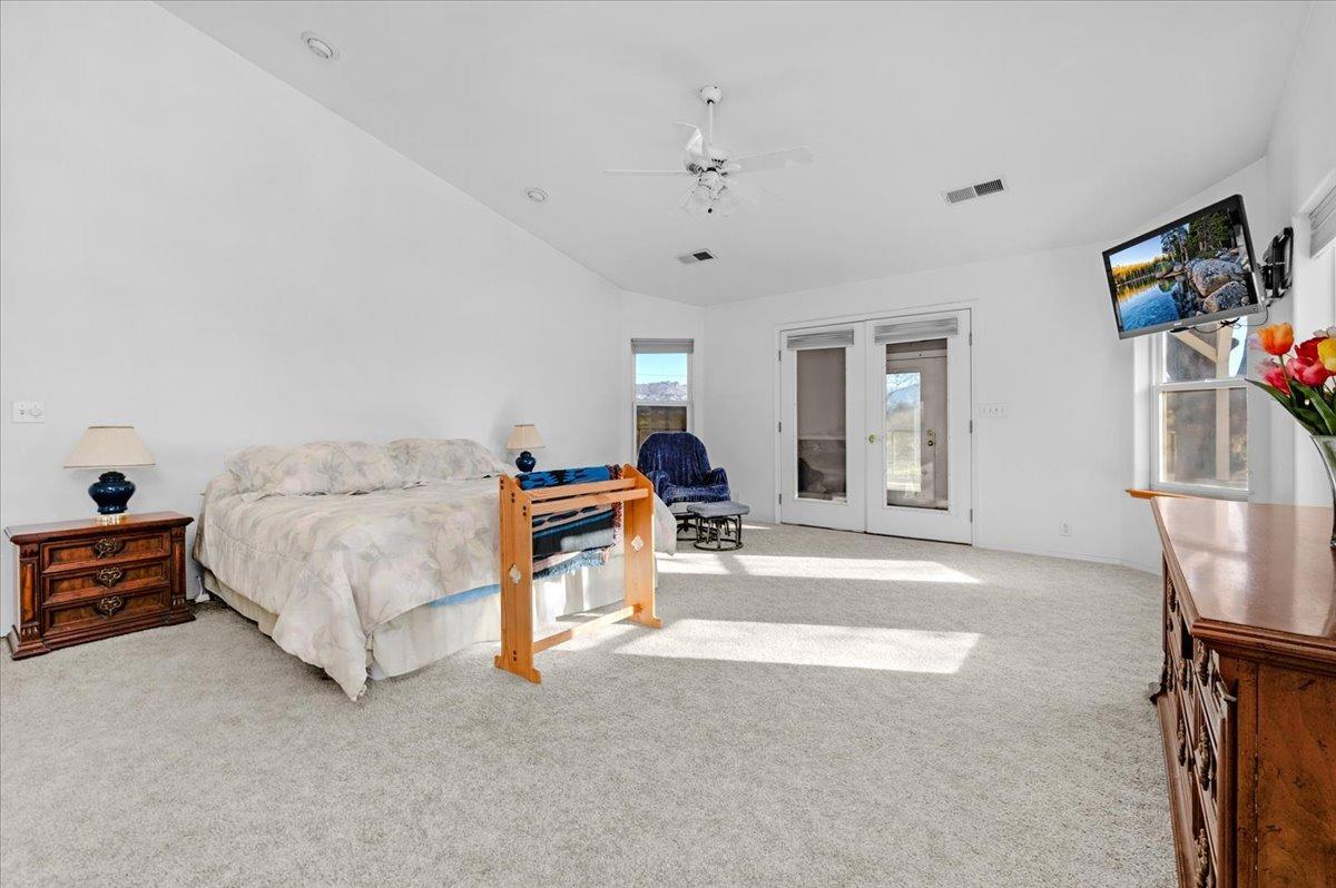 10925 Rusty Spur Lane Clovis, CA 93619 - Photo 34 of 94 a living room with furniture and a flat screen tv