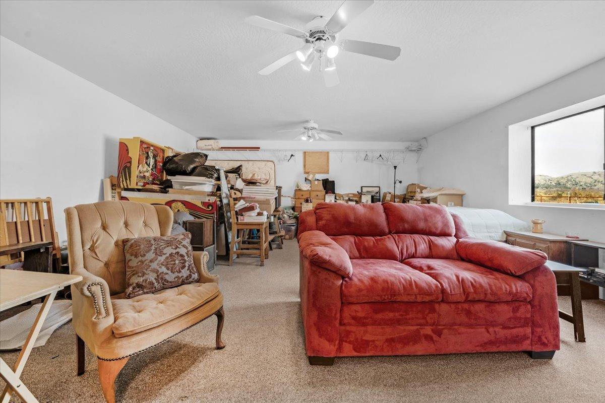 10925 Rusty Spur Lane Clovis, CA 93619 - Photo 49 of 94 a living room with furniture and kitchen view
