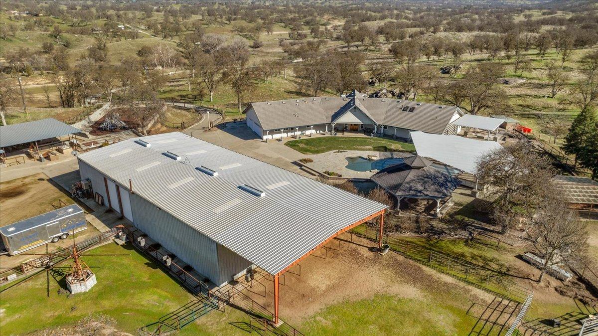 10925 Rusty Spur Lane Clovis, CA 93619 - Photo 65 of 94 an aerial view of a house with swimming pool and outdoor seating
