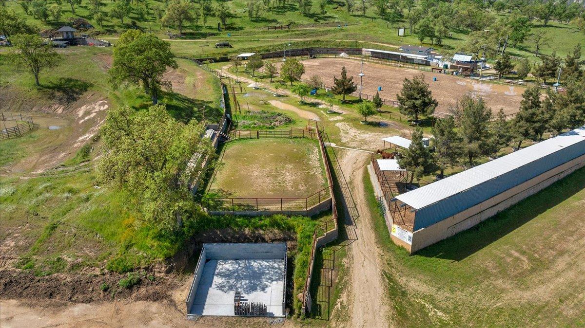 10925 Rusty Spur Lane Clovis, CA 93619 - Photo 81 of 94 Large wash rack, warm up pen, stalls with shelter, and arena.