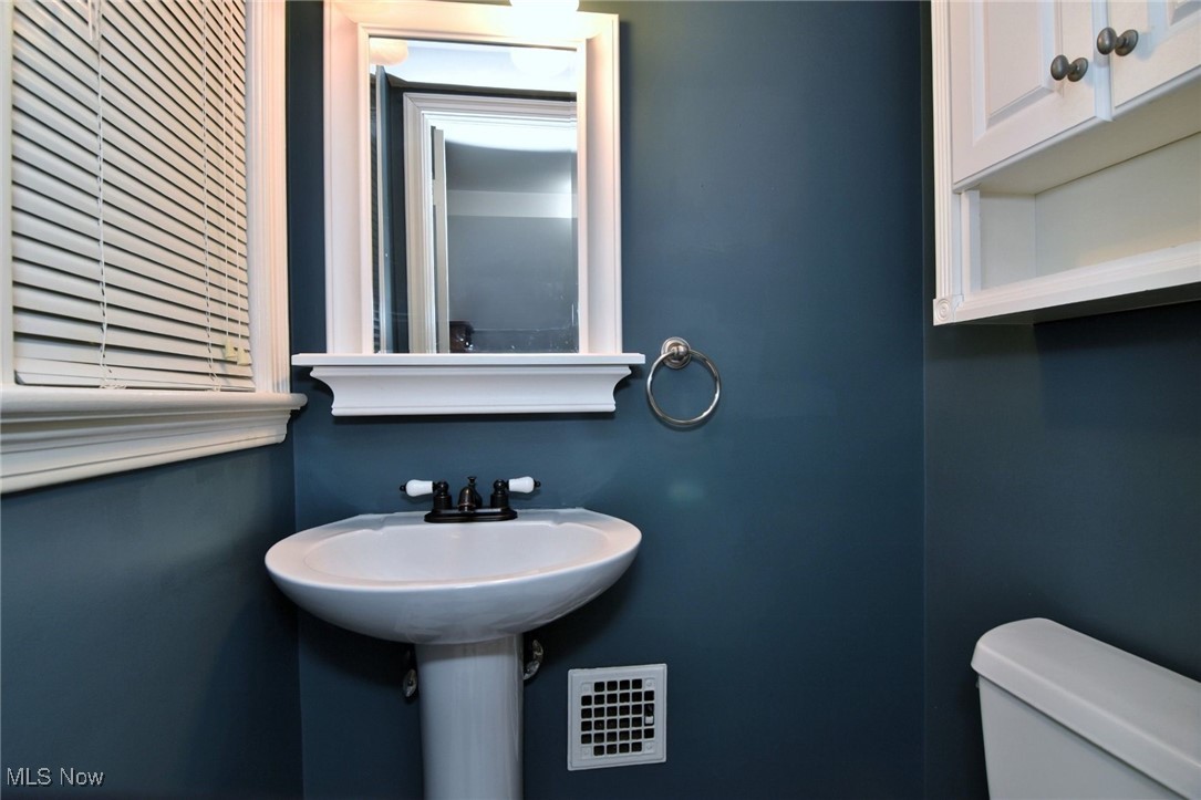 1448 Grenleigh Road Lyndhurst, OH 44124 - Photo 4 of 8 Half bathroom