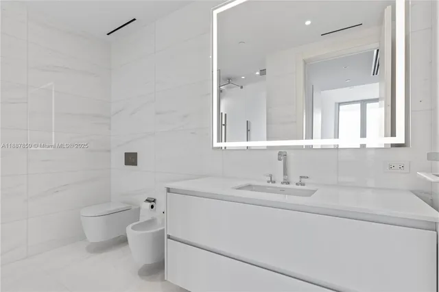 a view of a city with tall buildings