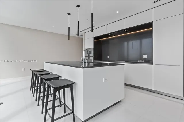 a view of a living room and filled with furniture