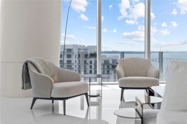 a view of swimming pool with wooden floor