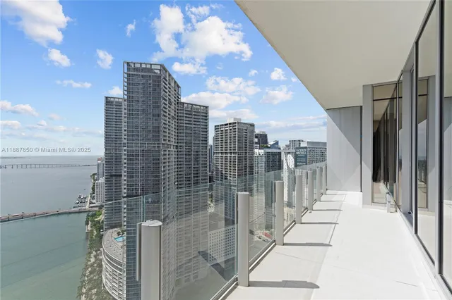 a bathroom with a sink toilet vanity and shower