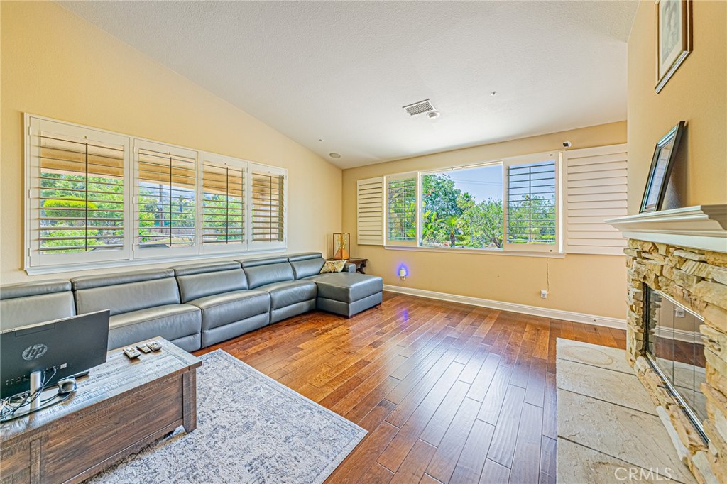 4088 Shady Ridge Circle Corona, CA 92881 - Photo 38 of 47 a living room with furniture and a large window