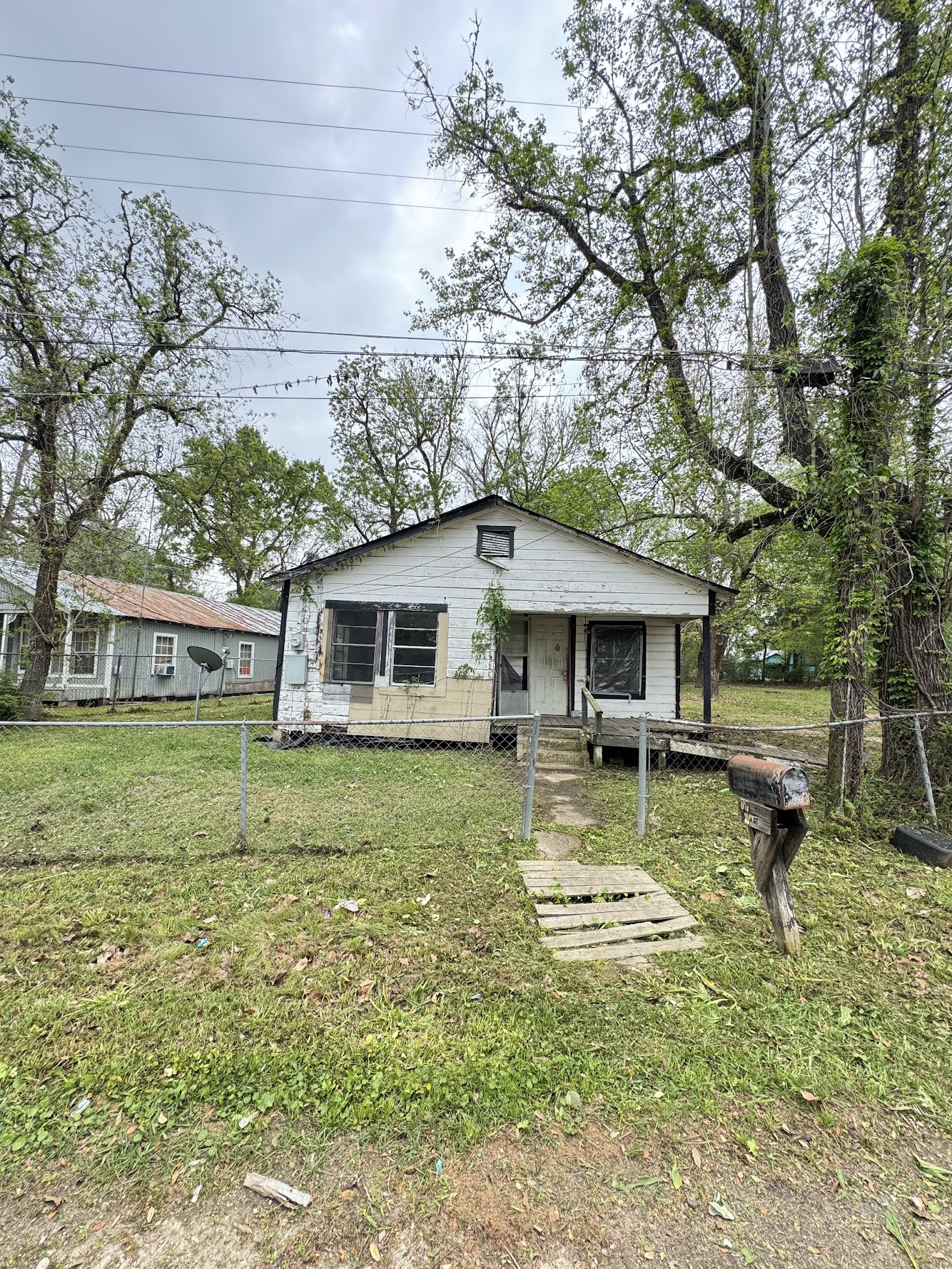916 Lamar Street Cleveland, TX 77327 - Photo 1 of 18 a view of a house with a yard chairs and a table