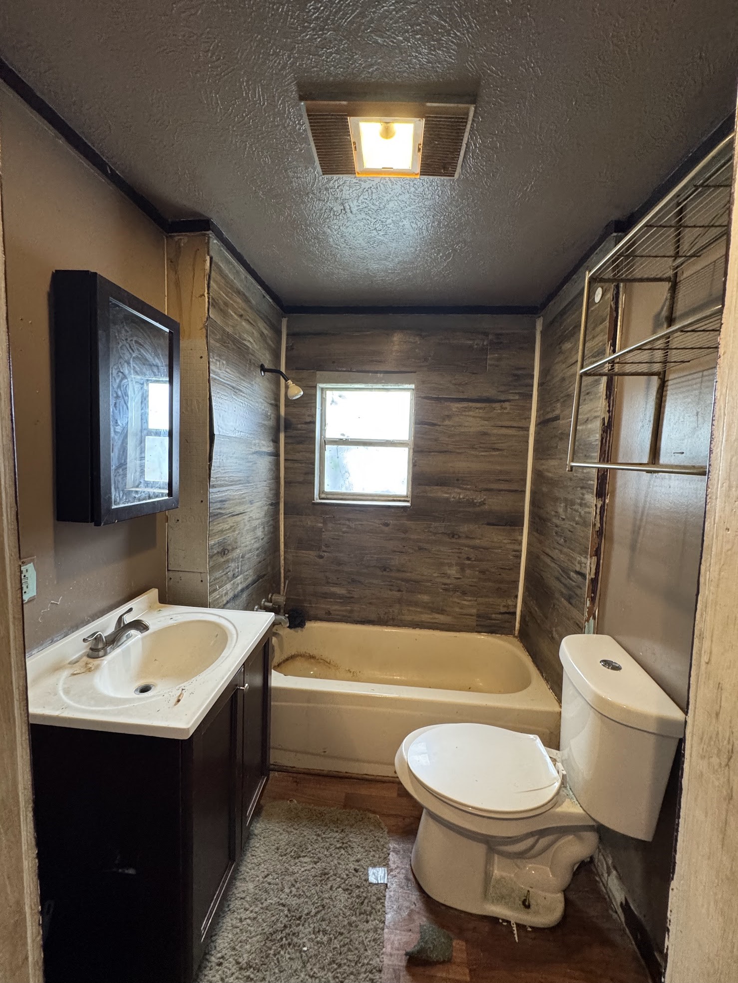 916 Lamar Street Cleveland, TX 77327 - Photo 13 of 18 a bathroom with a sink toilet and shower
