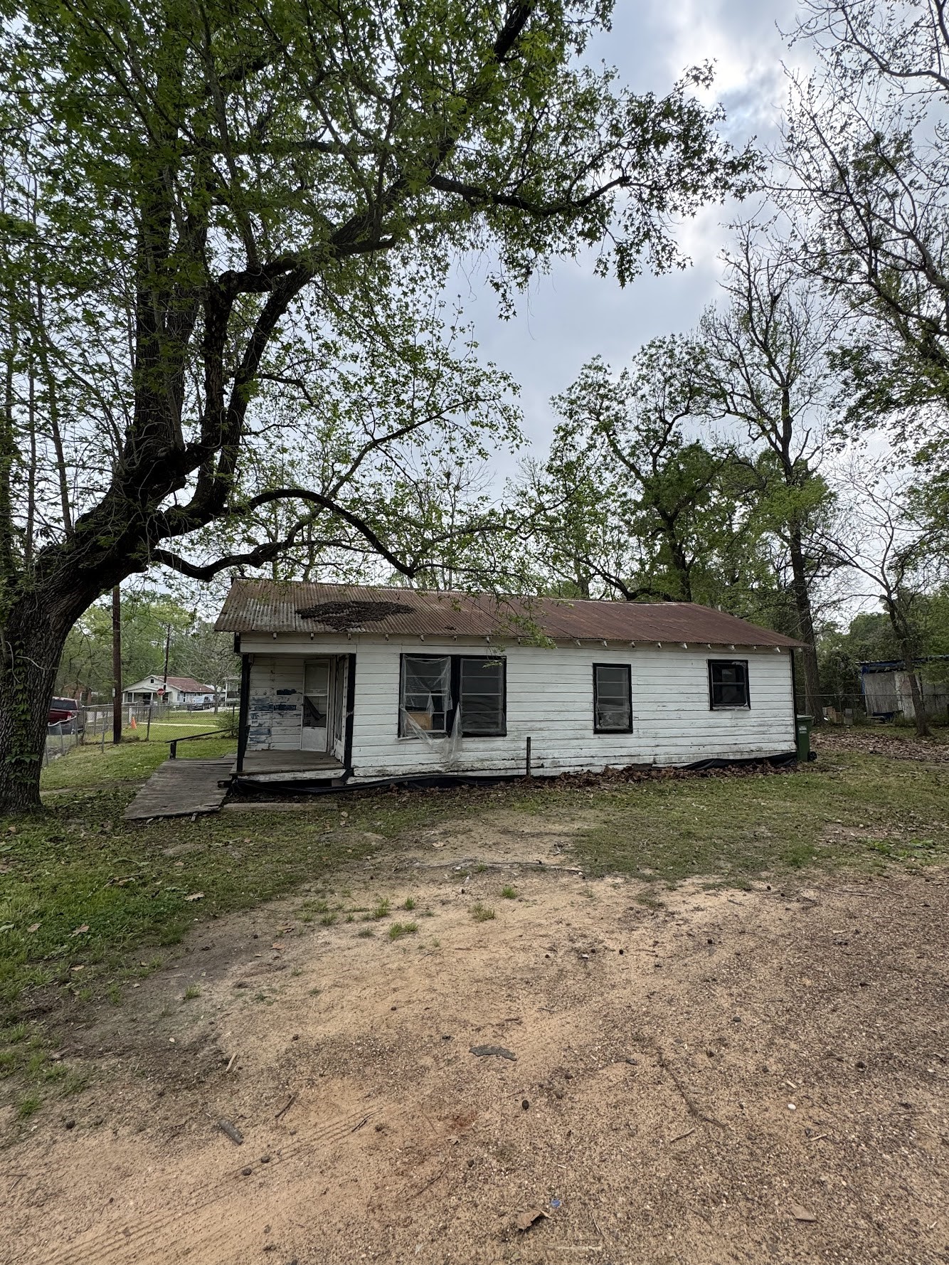 916 Lamar Street Cleveland, TX 77327 - Photo 4 of 18 a house that has a tree in front of it