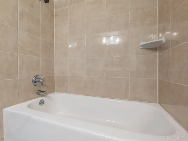 a view of a storage & utility room with washer and dryer