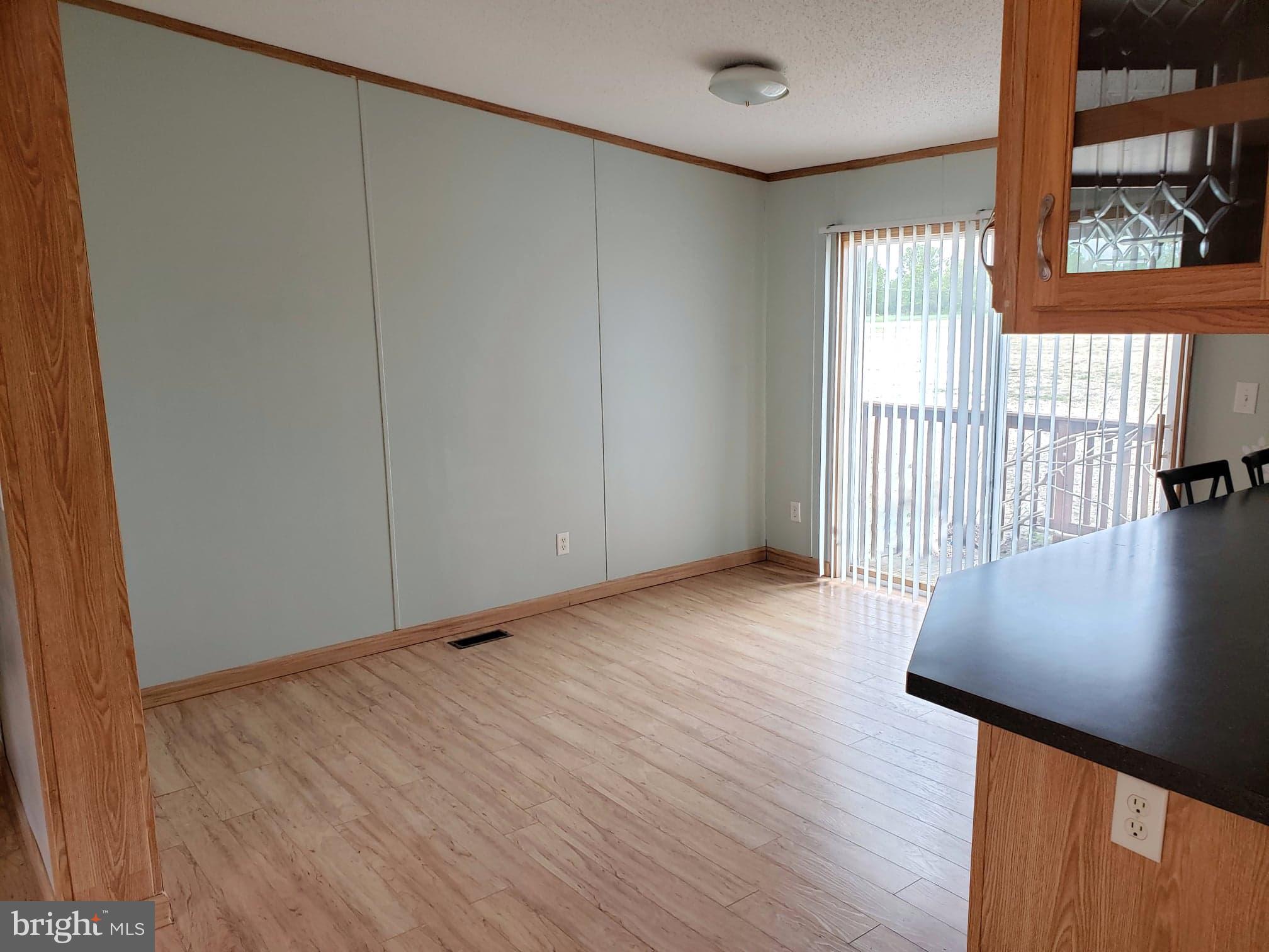 2 New Bridge Road, Unit A3 Quinton, NJ 08079 - Photo 6 of 15 a view of an empty room with a window