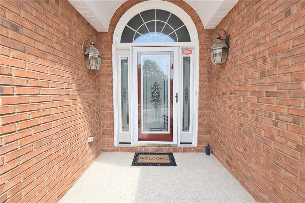 2395 Ashton Ridge Drive Dacula, GA 30019 - Photo 2 of 38 a front view of a house with a door