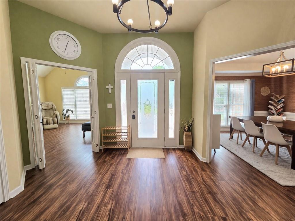 2395 Ashton Ridge Drive Dacula, GA 30019 - Photo 3 of 38 a view of livingroom with furniture and wooden floor