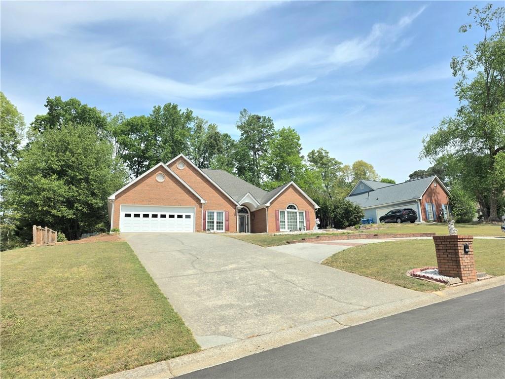 2395 Ashton Ridge Drive Dacula, GA 30019 - Photo 37 of 38 a view of a house with a outdoor space