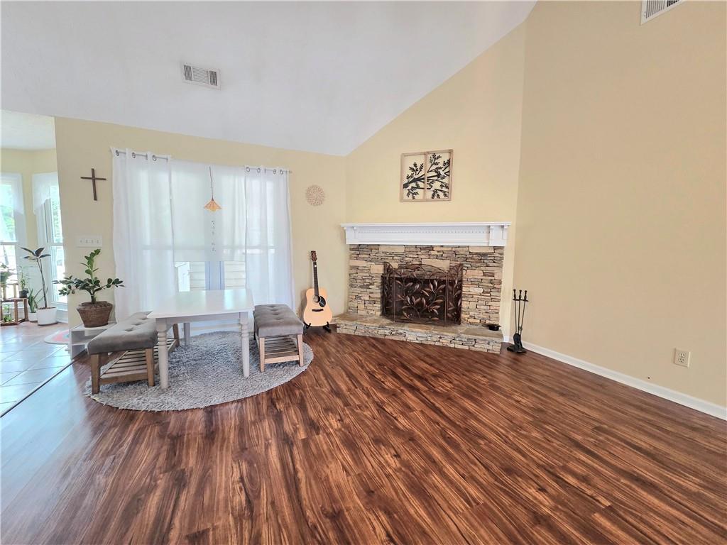 2395 Ashton Ridge Drive Dacula, GA 30019 - Photo 5 of 38 a living room with furniture and a fireplace