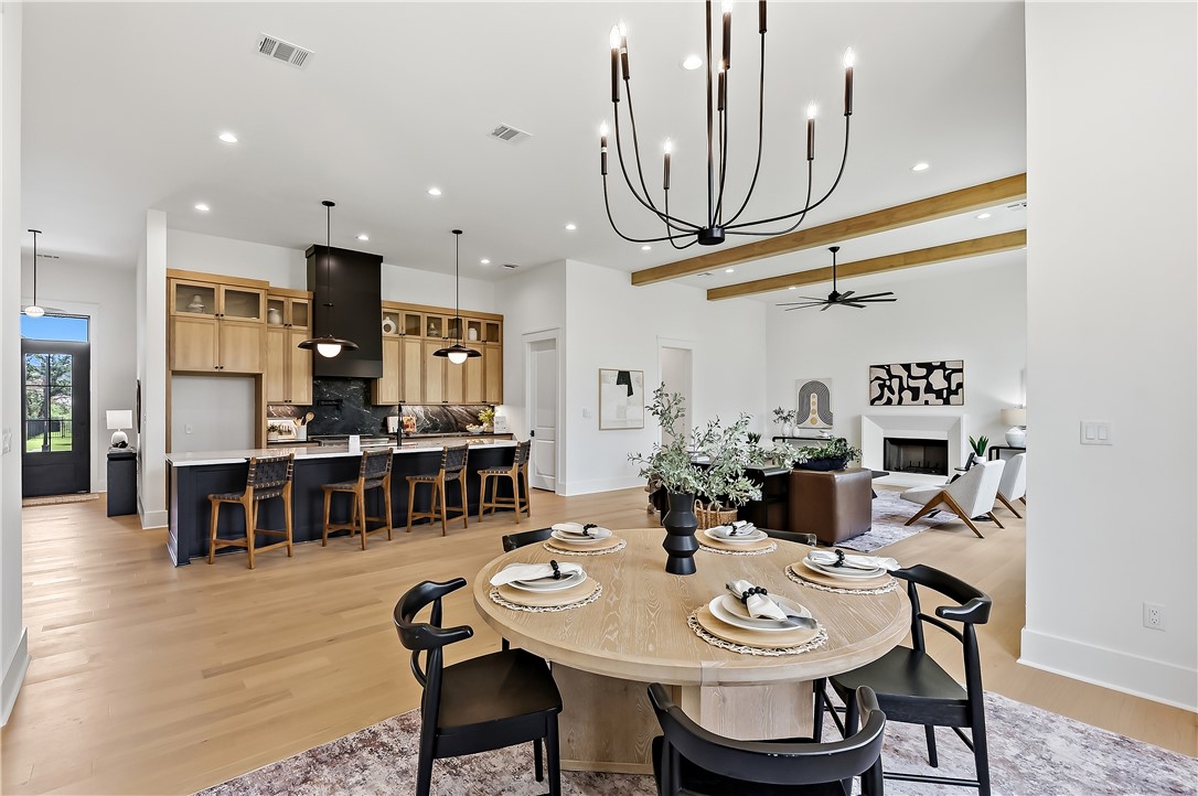 3022 Silverbell Court Bryan, TX 77807 - Photo 13 of 39 a view of a dining room with furniture