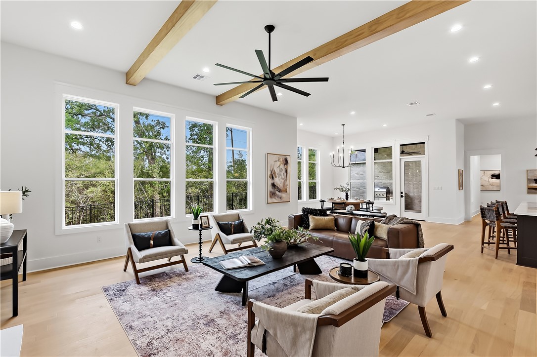3022 Silverbell Court Bryan, TX 77807 - Photo 20 of 39 a living room with furniture and a large window