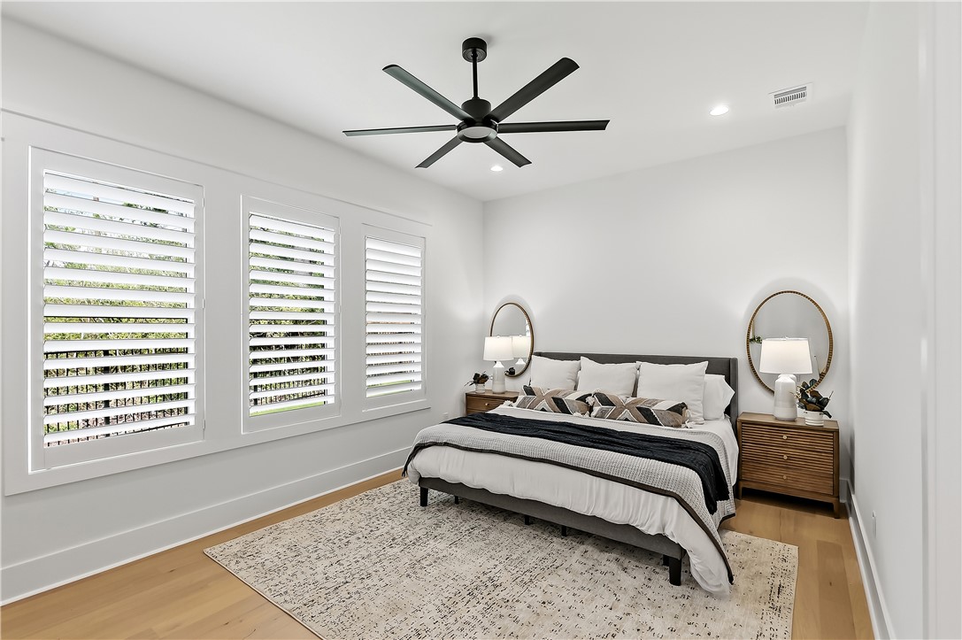 3022 Silverbell Court Bryan, TX 77807 - Photo 24 of 39 a bedroom with bed and a window