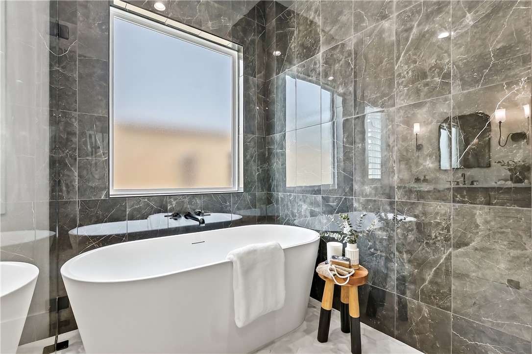 3022 Silverbell Court Bryan, TX 77807 - Photo 27 of 39 a bathroom with a sink and a mirror