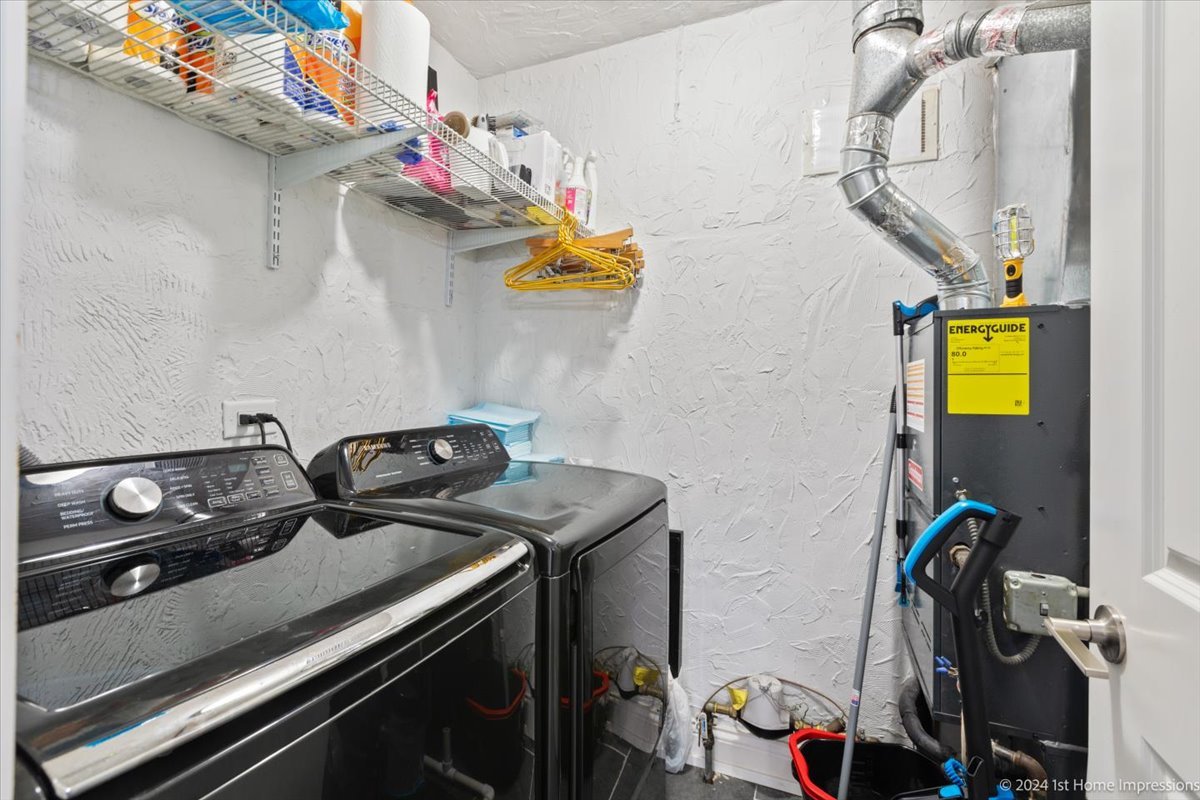 7 Cour Versaille Palos Hills, IL 60465 - Photo 17 of 20 a view of storage and utility room