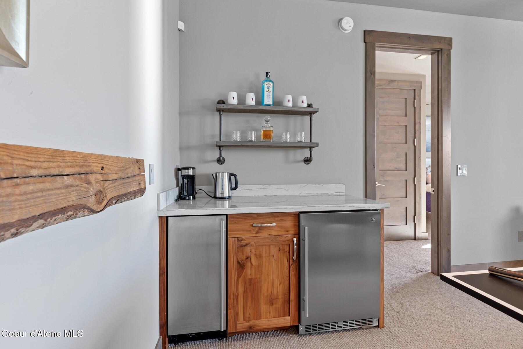 20890 South Inspiration Trail Harrison, ID 83833 - Photo 51 of 68 Rec room beverage and ice maker