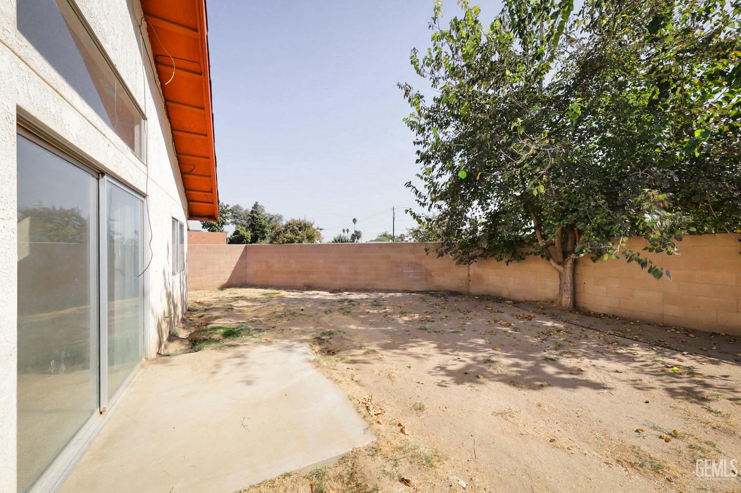Undisclosed Address Bakersfield, CA 93304 - Photo 20 of 21 a view of a backyard of the house