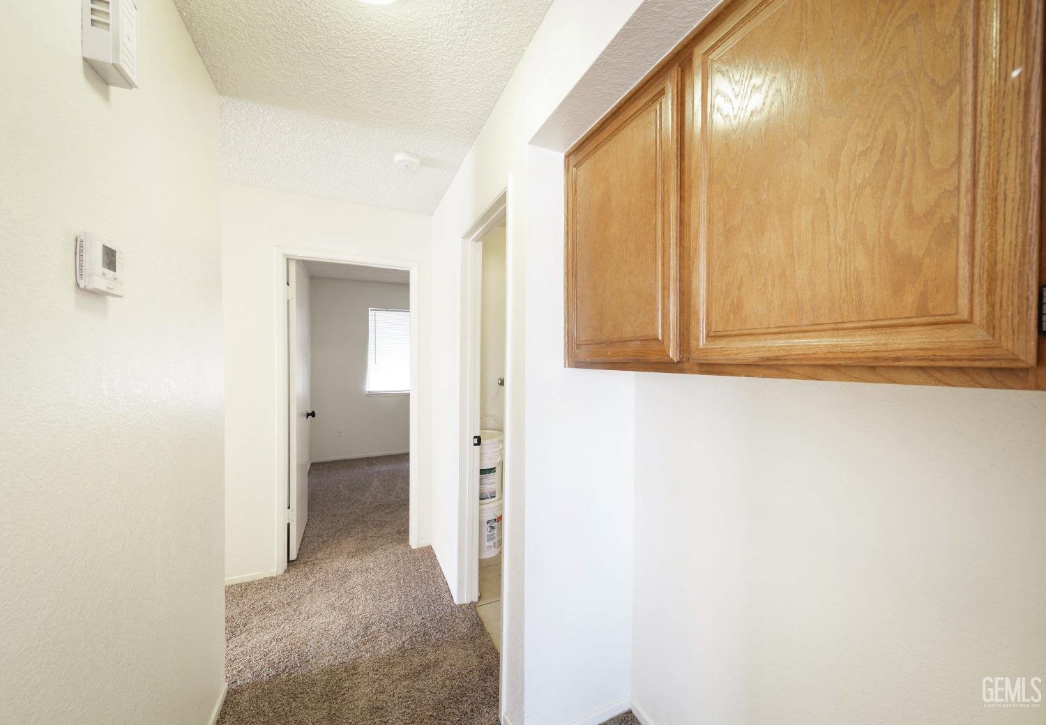 Undisclosed Address Bakersfield, CA 93304 - Photo 21 of 21 a view of a bathroom with sink and mirror