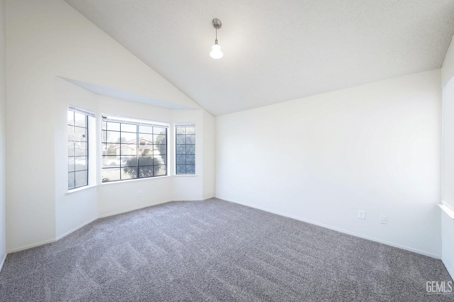 Undisclosed Address Bakersfield, CA 93304 - Photo 6 of 21 a view of an empty room with a window