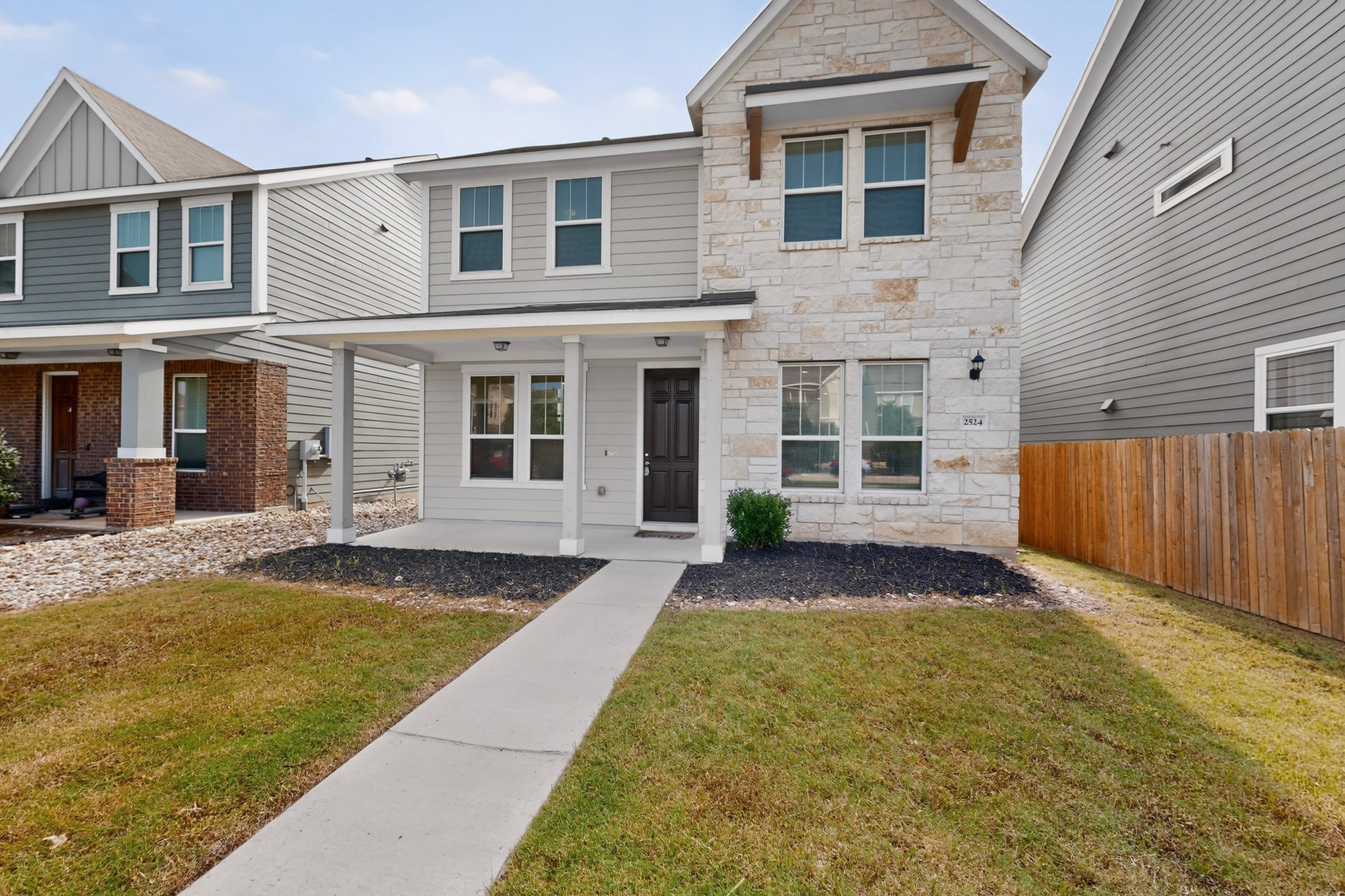2524 Acoma Lane Leander, TX 78641 - Photo 1 of 27 a front view of a house with a yard