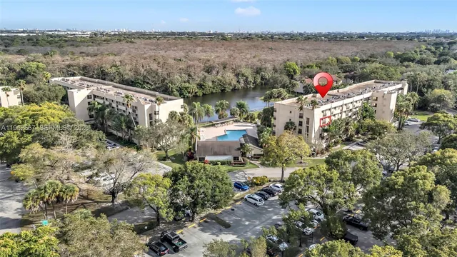 a terrace with outdoor seating and lake view