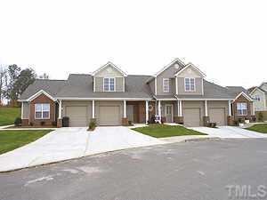 2815 Andover Glen Road Raleigh, NC 27604 - Photo 1 of 1 a front view of a house with a yard