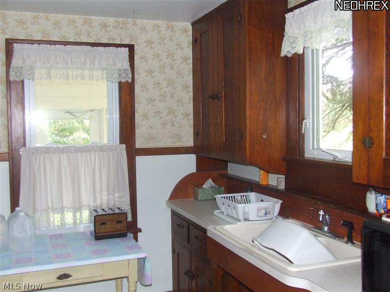 12259 Butternut Road Newbury, OH 44065 - Photo 9 of 21 Charming country kitchen featuring solid wood cabinets and beautiful woodwork