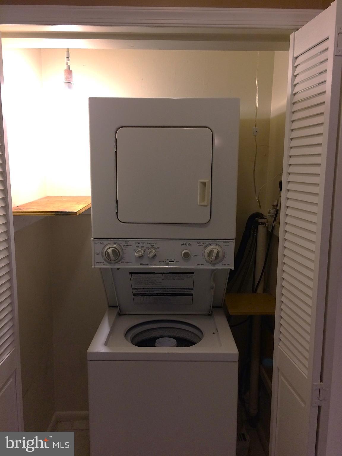 250 Ridge Pike, Unit CONDO 349 Lafayette Hill, PA 19444 - Photo 15 of 16 Compact laundry solution in a cozy nook.