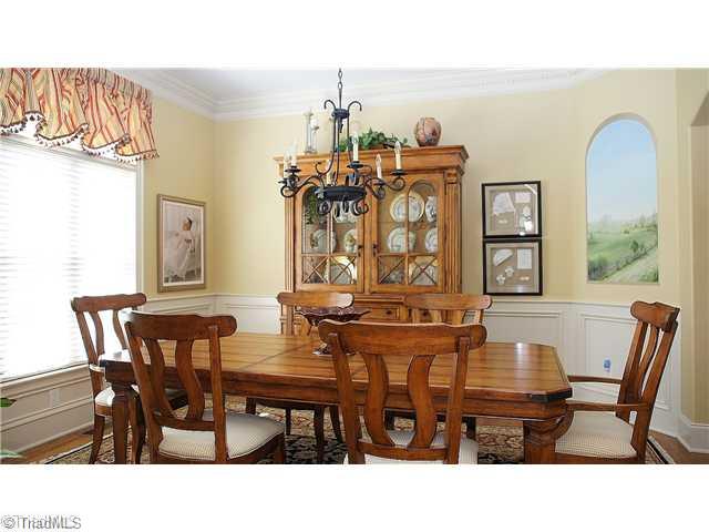 5617 Foxbury Drive Oak Ridge, NC 27310 - Photo 6 of 15 Dining Room. Formal Dining Room W/Extensive Moldings & Hand Painted Mural
