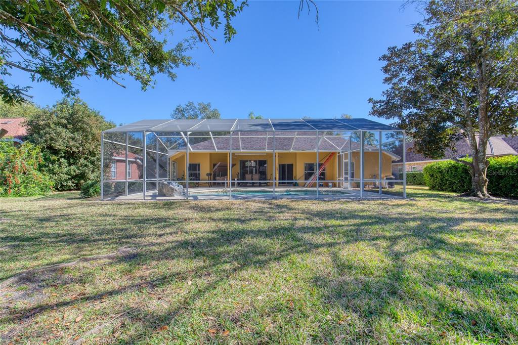4 Cliffside Drive Ormond Beach, FL 32174 - Photo 47 of 65 a view of a house with a big yard