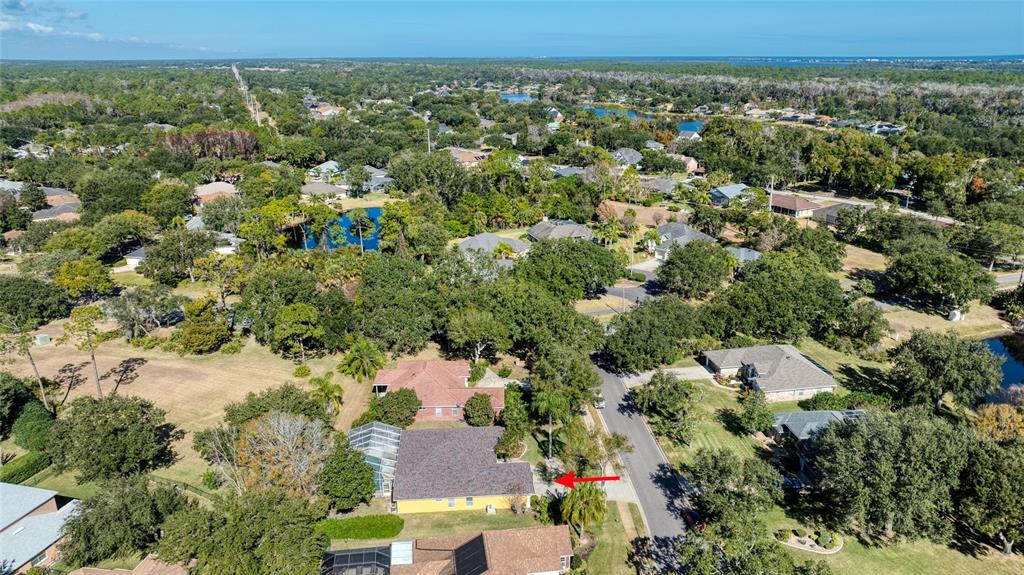 4 Cliffside Drive Ormond Beach, FL 32174 - Photo 53 of 65 an aerial view of a house with a yard