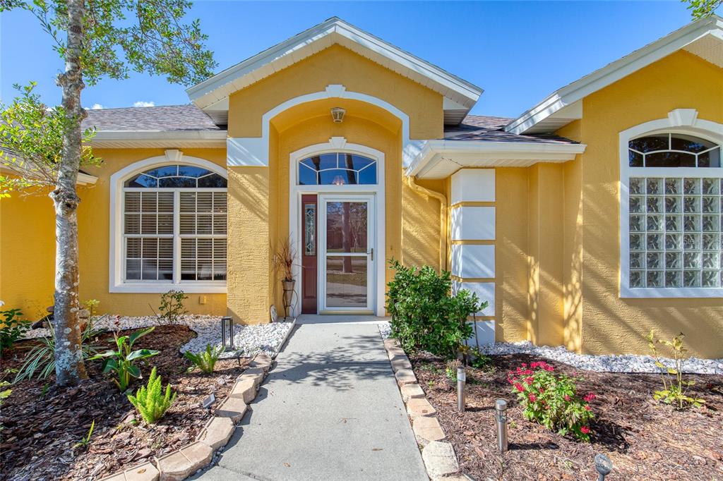 4 Cliffside Drive Ormond Beach, FL 32174 - Photo 7 of 65 a front view of a house