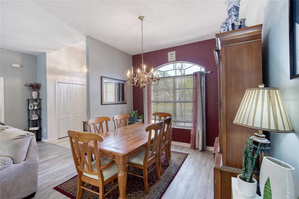 4 Cliffside Drive Ormond Beach, FL 32174 - Photo 10 of 65 a dining room with furniture and window
