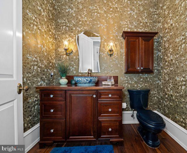 200 Parsons Road Landenberg, PA 19350 - Photo 16 of 55 a bathroom with a sink a mirror and a toilet