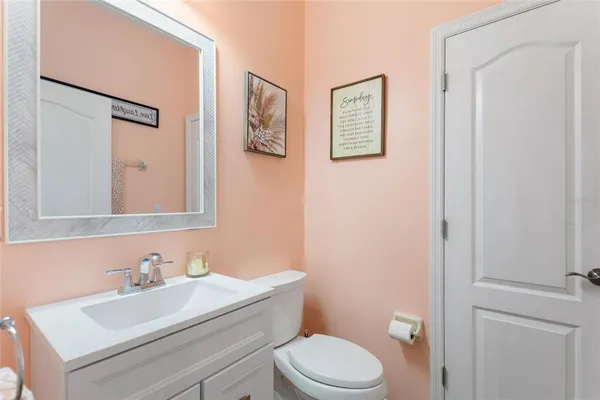 a room with furniture and a flat screen tv