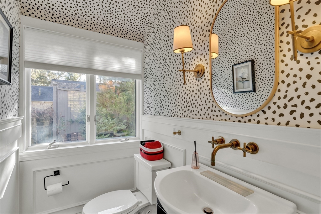 33 Avon Road Wellesley, MA 02482 - Photo 24 of 35 a bathroom with a sink mirror and toilet