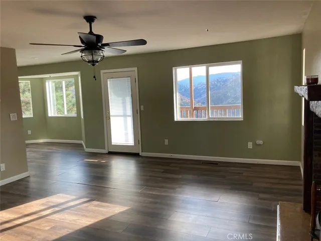 a living room with a fireplace