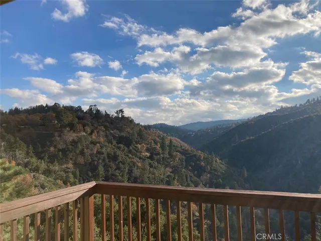 a balcony with an outdoor space