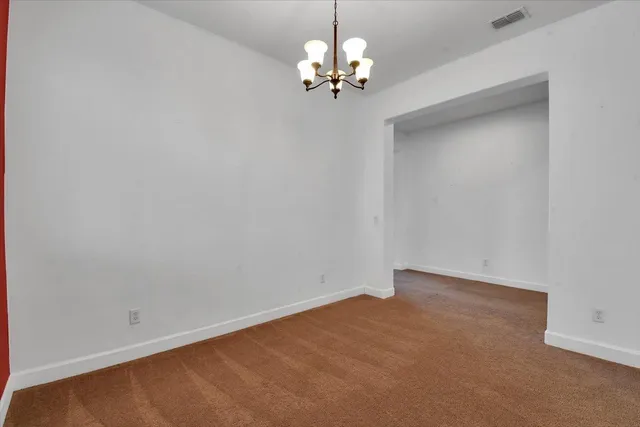 a view of a livingroom with a flat screen tv