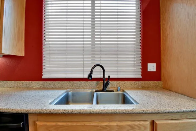 a bathroom with a toilet and a tub