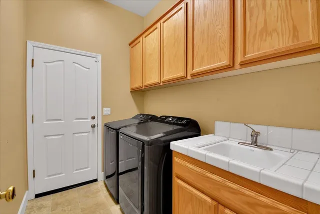 a view of a bedroom with baby crib