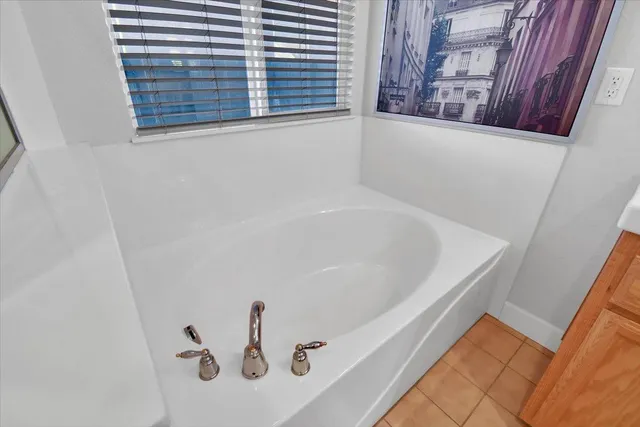 a view of a house with a sink and a yard