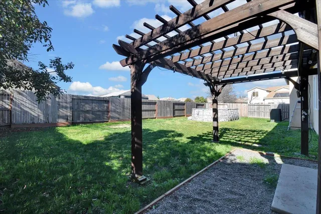 a backyard of a house with lots of green space